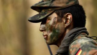 A recruit listens to instructions during a training exercise in the town of Ahlen.